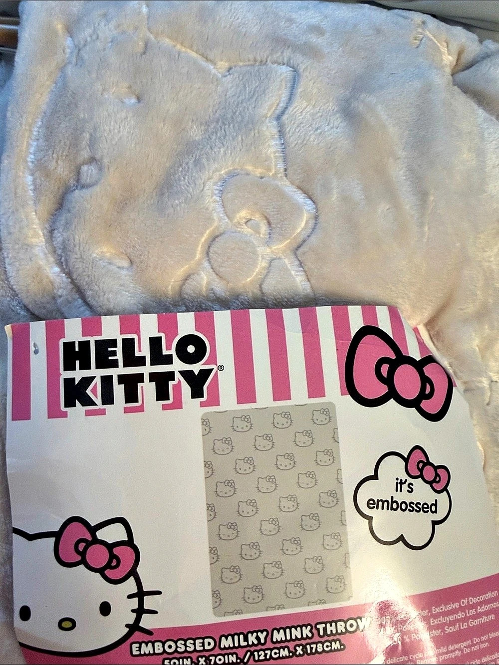 Hello Kitty Embossed Milky Mink Throw Embossed Throw in an Ivory color. NWT